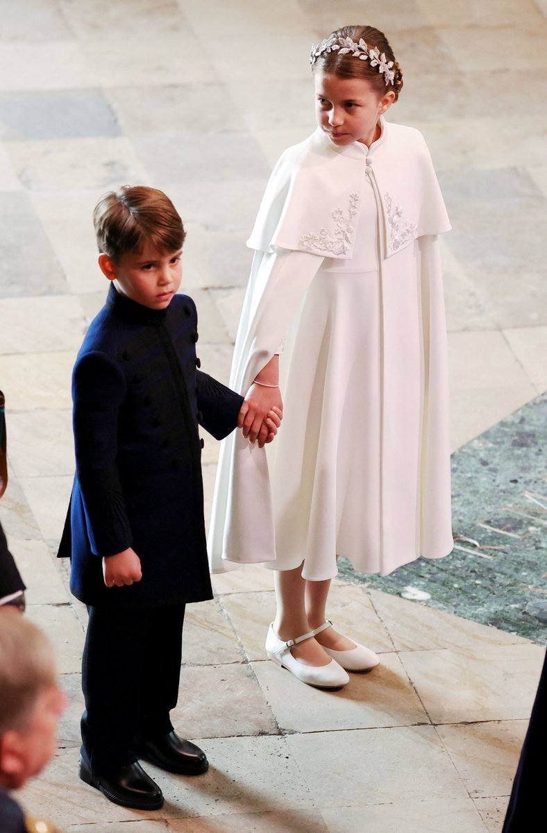 See the sweet moment #PrinceLouis and #PrincessCharlotte shared upon arriving at Westminster Abbey! See more adorable Wales family moments: bit.ly/3M16RaD