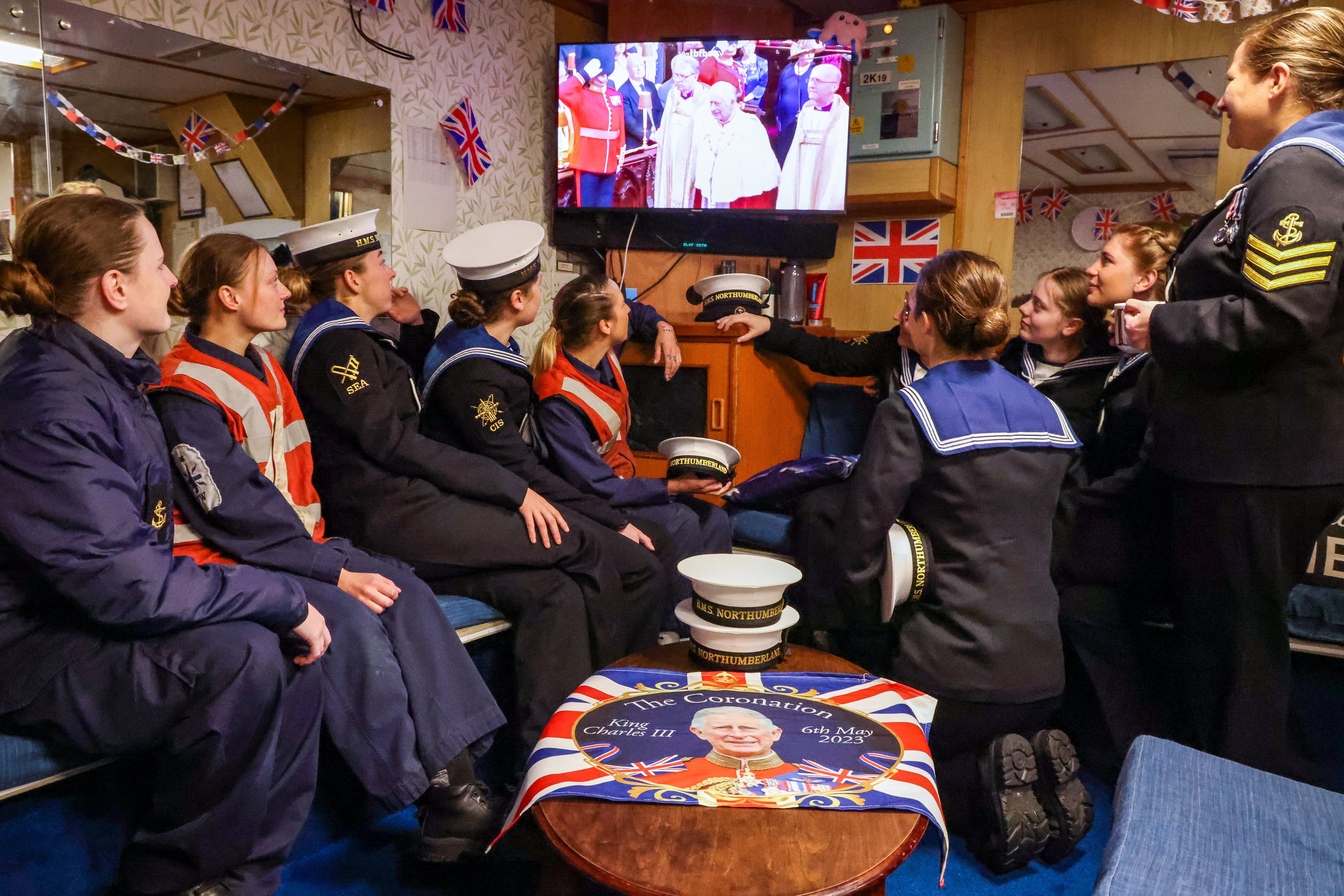 Royal Navy Sailors watch The Coronation on HMS Northumberland