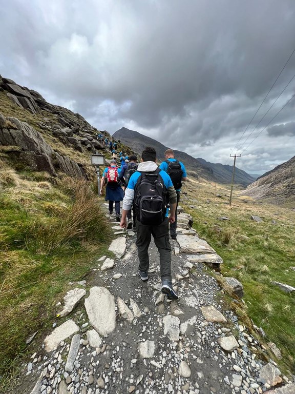 Despite heavy wind and rain the RAJA Ramblers have smashed it and completed the climb! Well done team - an amazing effort. They've now sought sanctuary in a local eatery and are warming up from the cold! Great work!   

#succeedtogether #RAJARamblers #SnowdonClimb #BeTheBest