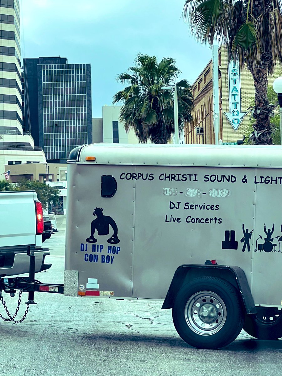 You know your Corpus is showing when you’re rockin’ such top shelf clip art on your DJ trailer.
