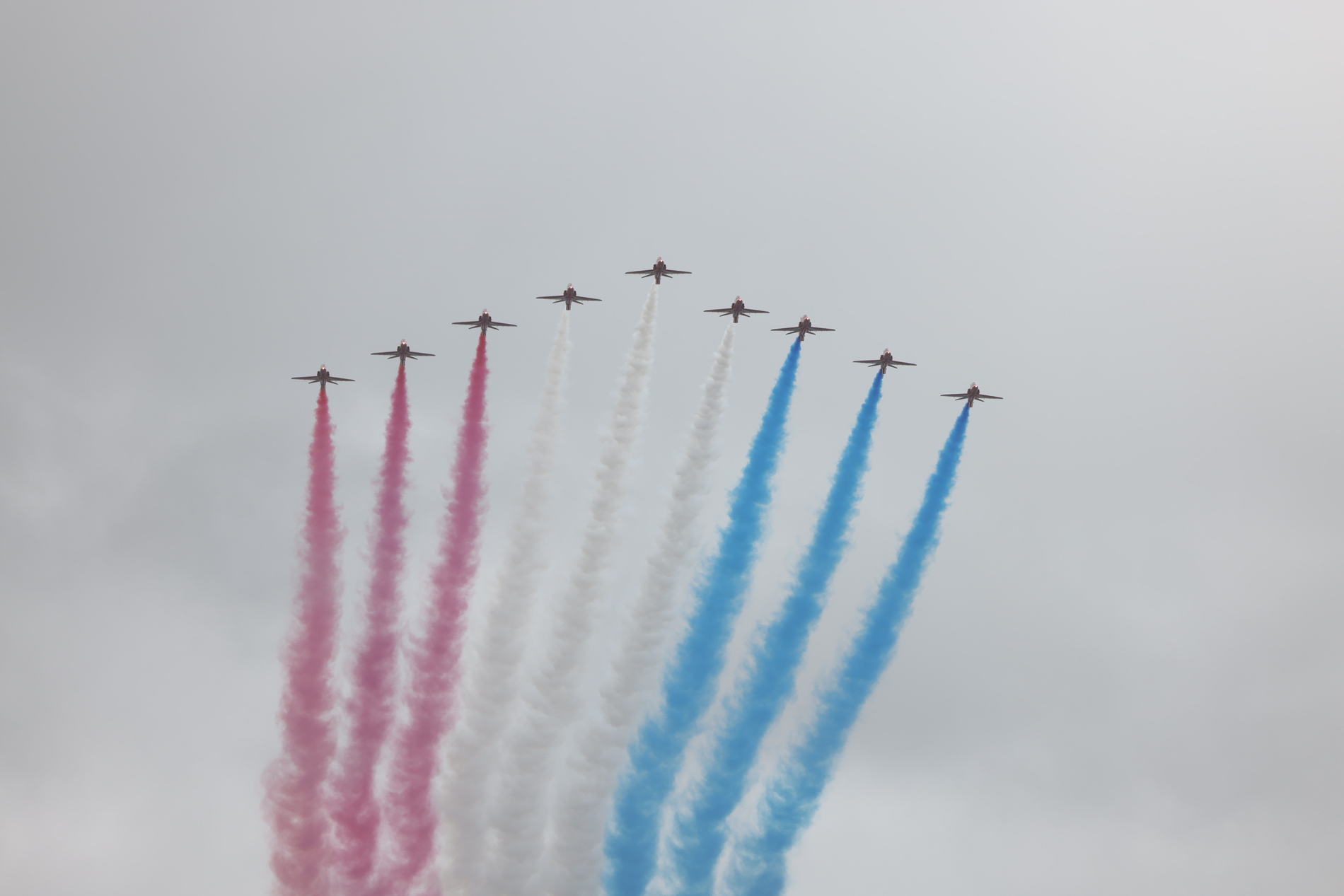 The Red Arrows flying in formation.