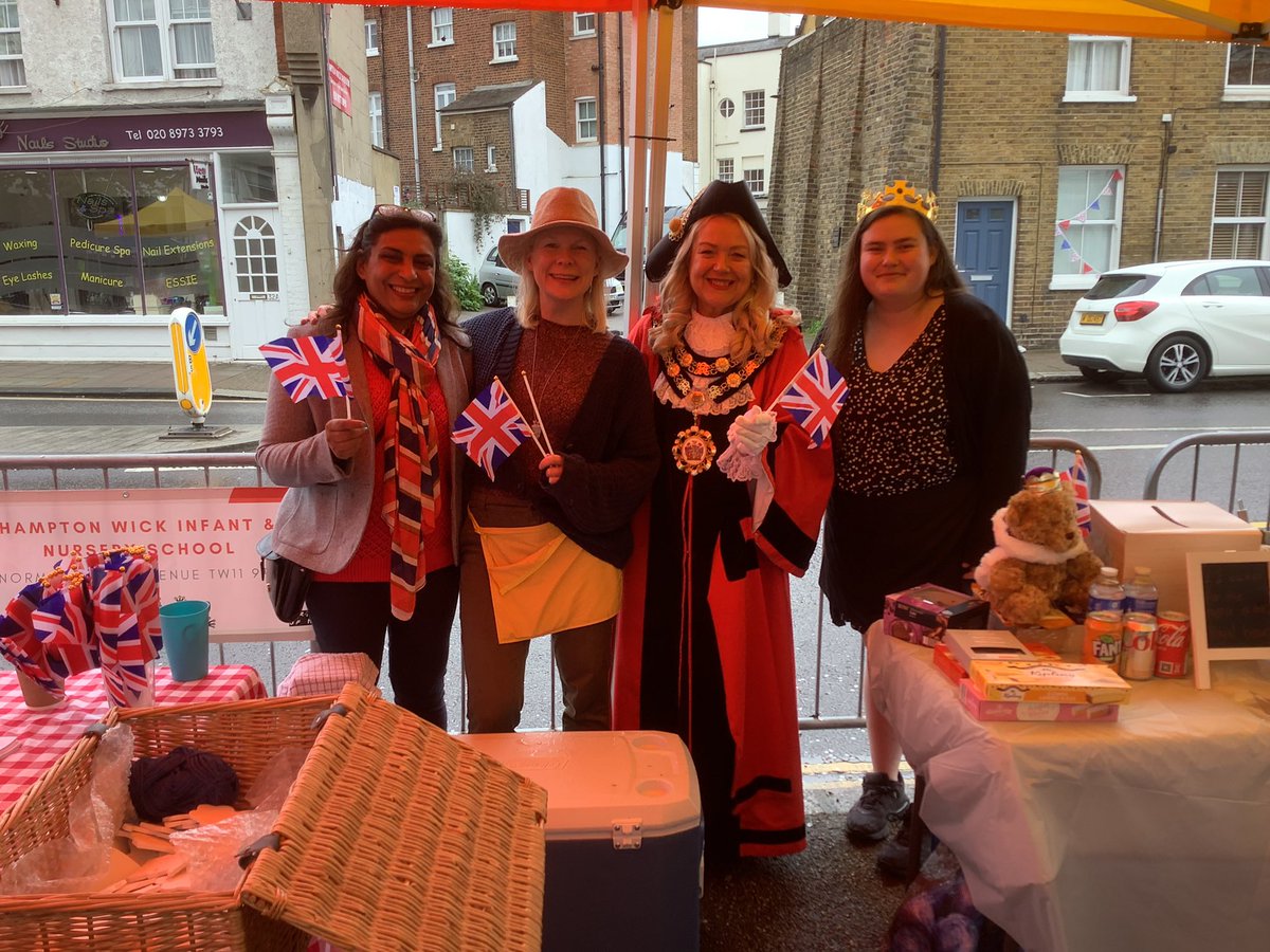 LBRUTMayor's tweet photo. So pleased to join local Cllrs Fleming, Millard &amp; Leader at the Hampton Wick Business Assoc. Coronation celebration. The weather didn’t deter the attendees. Great function at brilliant location. Thanks to all the stall holders &amp; local Growth officer Max. #Coronation https://t.co/gXkhu4tRD8