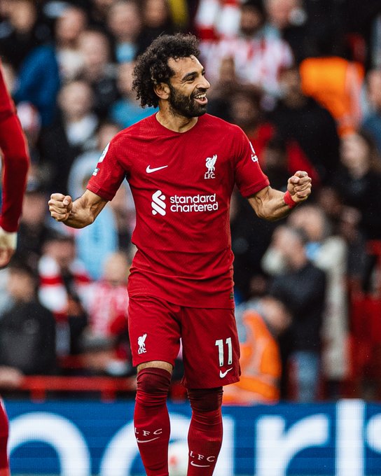 Mo Salah celebrates after scoring our opening goal against Brentford at Anfield, bringing up a number of milestones.
