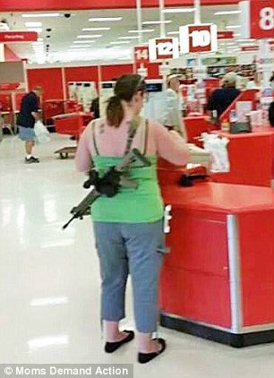 MrReynolds52's tweet photo. This picture of people in Target  with assault weapons is perfectly legal in Texas. Police cannot say one thing to stop someone from walking into a mall or department store or coffee shop because of open carry laws in Texas and other states. How much blood has to be spilled? @AP https://t.co/GKDx7XLc90