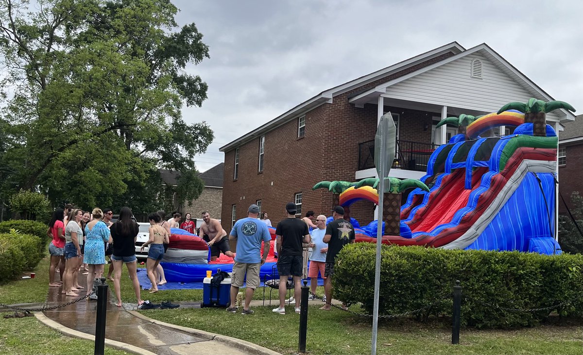 Yes - there were some dads celebrating their kids’ graduations on this water slide!  #uacommencement2023