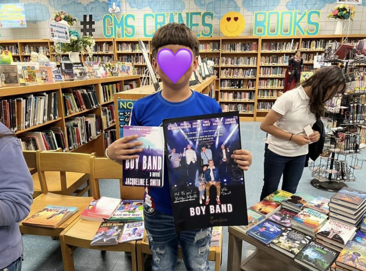 JackieSmith114's tweet photo. These pictures make me the happiest! Thank you to my dear friend for sharing the gift of reading with so many wonderful young minds! And for including #BoyBand as part of your #SummerReading!! Seeing so many readers excited about their copies truly made my entire day! 💜💜💜 https://t.co/q0mYhkataz
