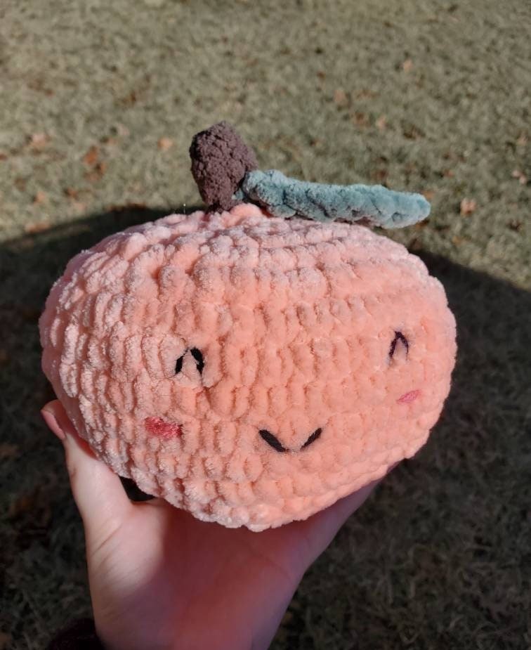 CrochetClayCat's tweet photo. Now on sale! Kawaii Peach Crocheted Plushie | Kawaii Food Plush | Fruit Stuffed Animal | Peaches Plush #cutefoodgift #kawaiiplushie #stressedstudent #anxietyrelief #crochetplushs #giftforgirlfriend https://t.co/VIyEgvjrpC https://t.co/T8XMsPUp5u