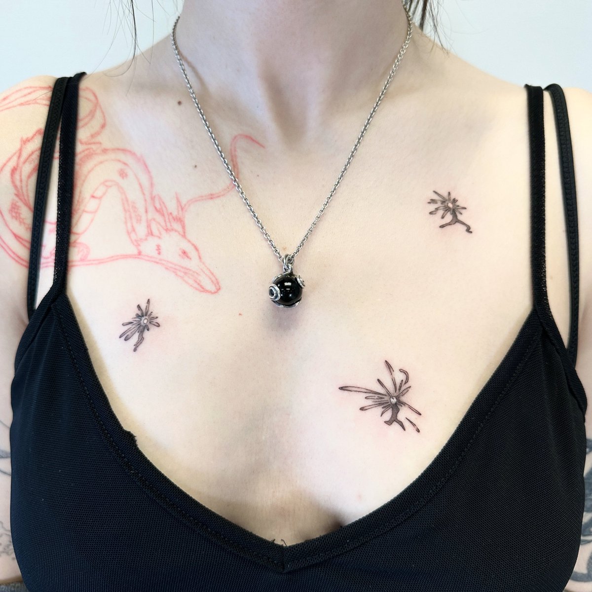 i have the falling stars from howls moving castle around my heart ^.^