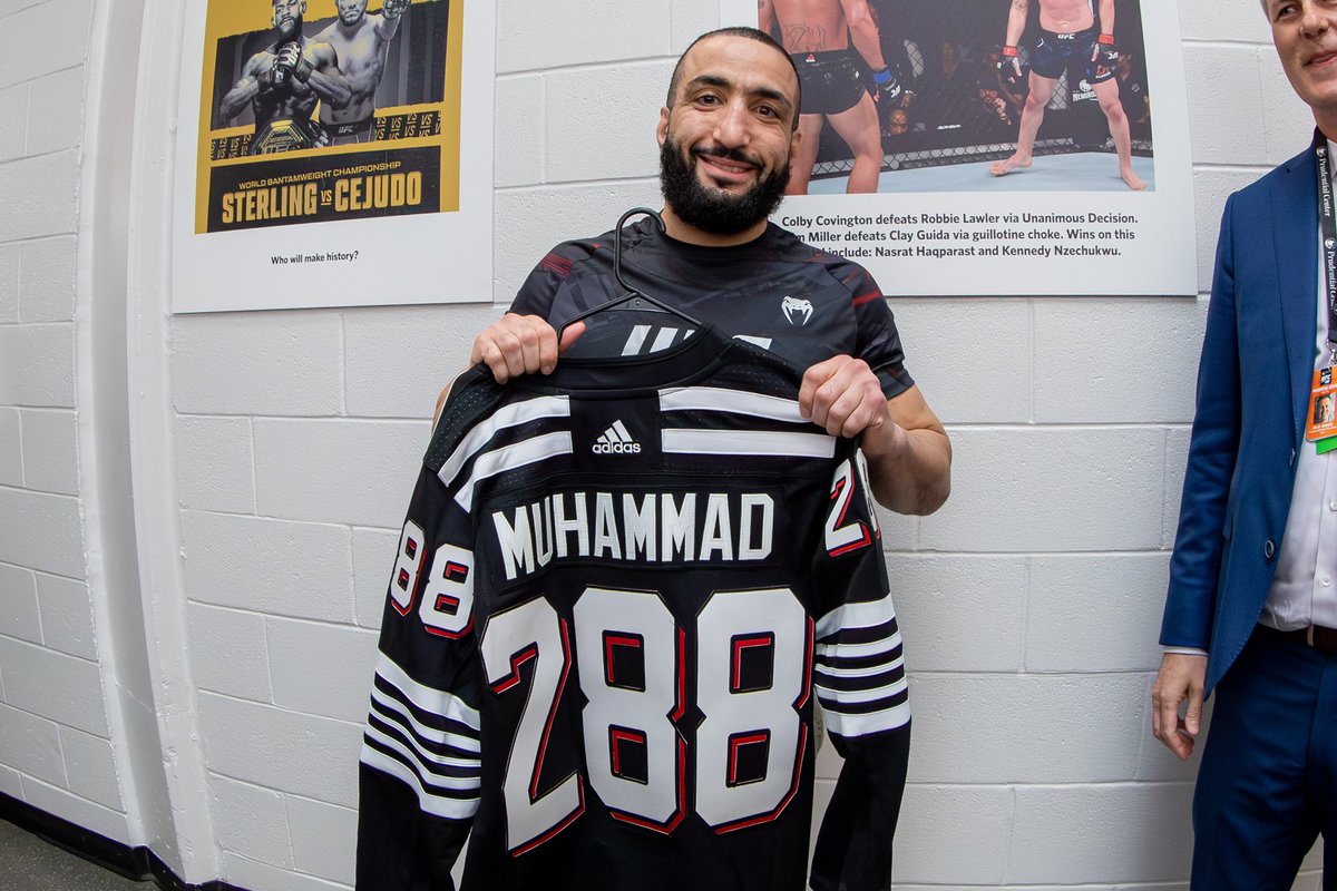 PruCenter's tweet photo. When two worlds collide! #UFC288 

@NJDevils 🤝 @ufc https://t.co/3XQip7ZyKY