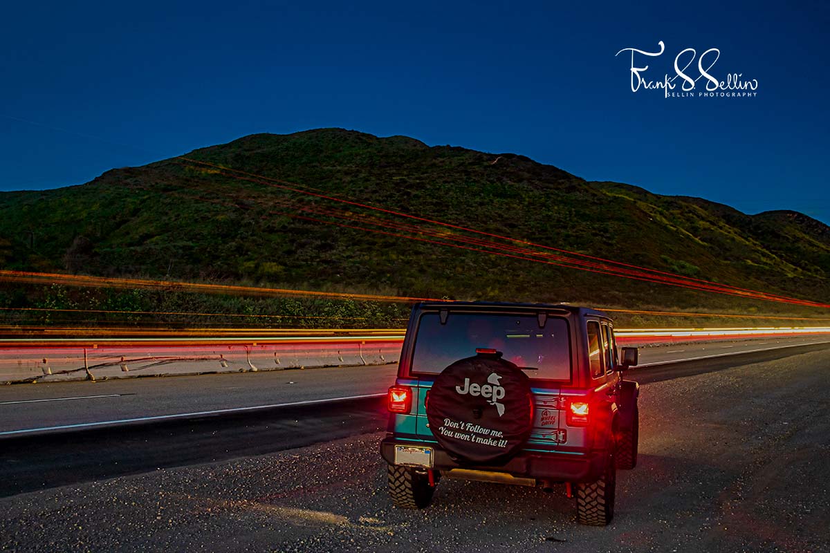 "Teal Raven from the Rear" Traffic passing the Raven along the Southbound 101 as the sky falls dark.

© Sellin Photography All Rights Reserved