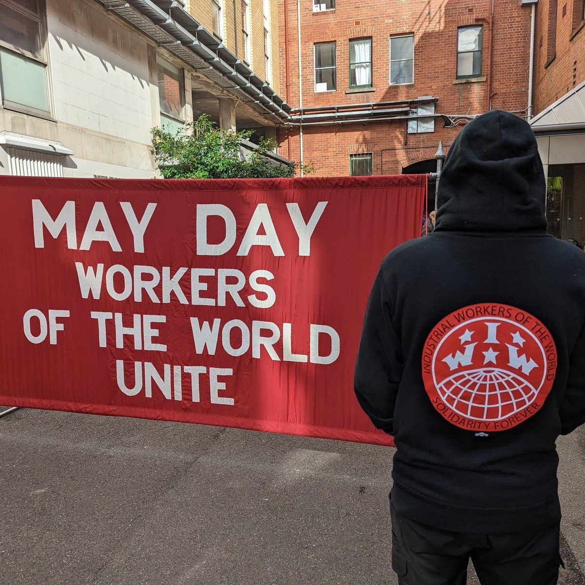 iwwmelbourne's tweet photo. Comrades at the Trades Hall #MayDay event holding the banner high and the spirit strong. Workers of the world unite!!

#IWW #WorkersUnion #Solidarity #StrengthInUnity https://t.co/or2wLfWHZk
