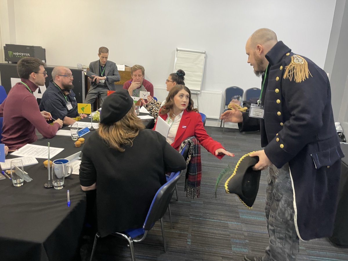 UKGamesExpo's tweet image. Join us for the sci-fi megagame Den of Wolves in Birmingham on June 2nd, the first day of UK Games Expo. Can you and 30-40 other players survive spaceship battles, dwindling resources, and traitors in your midst? Come and find out! 🐺🚀

 Tickets here: ukgamesexpo.co.uk/events/801-den…