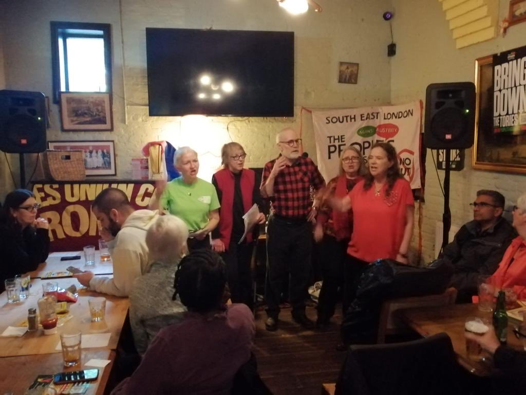 wellredchoir's tweet photo. A handful of Well Reds made it to sing, rebel and revel at the People’s Assembly Not the Coronation social at the Railway Tavern in Bromley #NotOurKing #CampaignChoirs #WellRedChoir https://t.co/cMEYXCGpEL