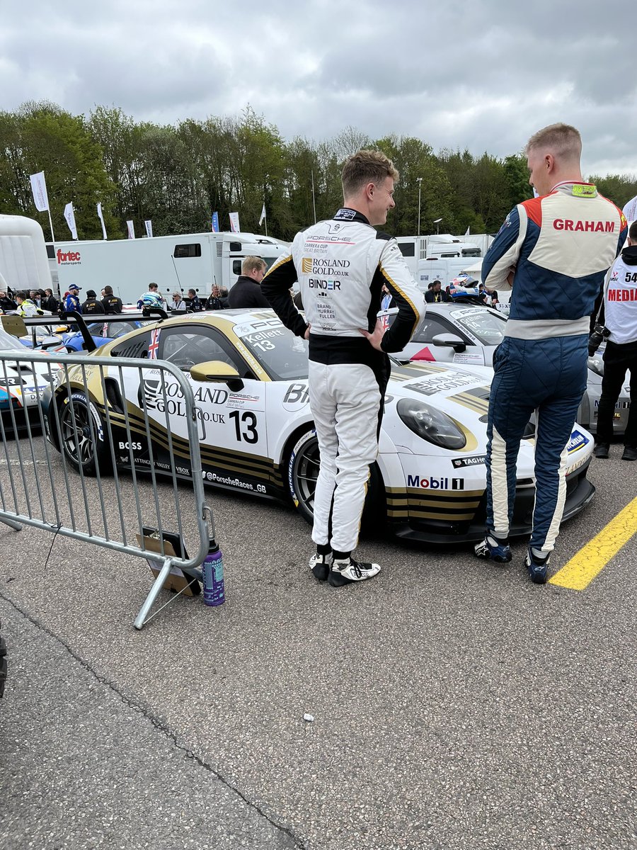 James Kellett chatting to Matty Graham in the holding area.  Race delayed due barrier repair - a result of Touring Cars multi-car crash. Red flag on that BTCC race, so delayed start on #CarreraCupGB race.   #RoslandGold #PorscheMotorsport