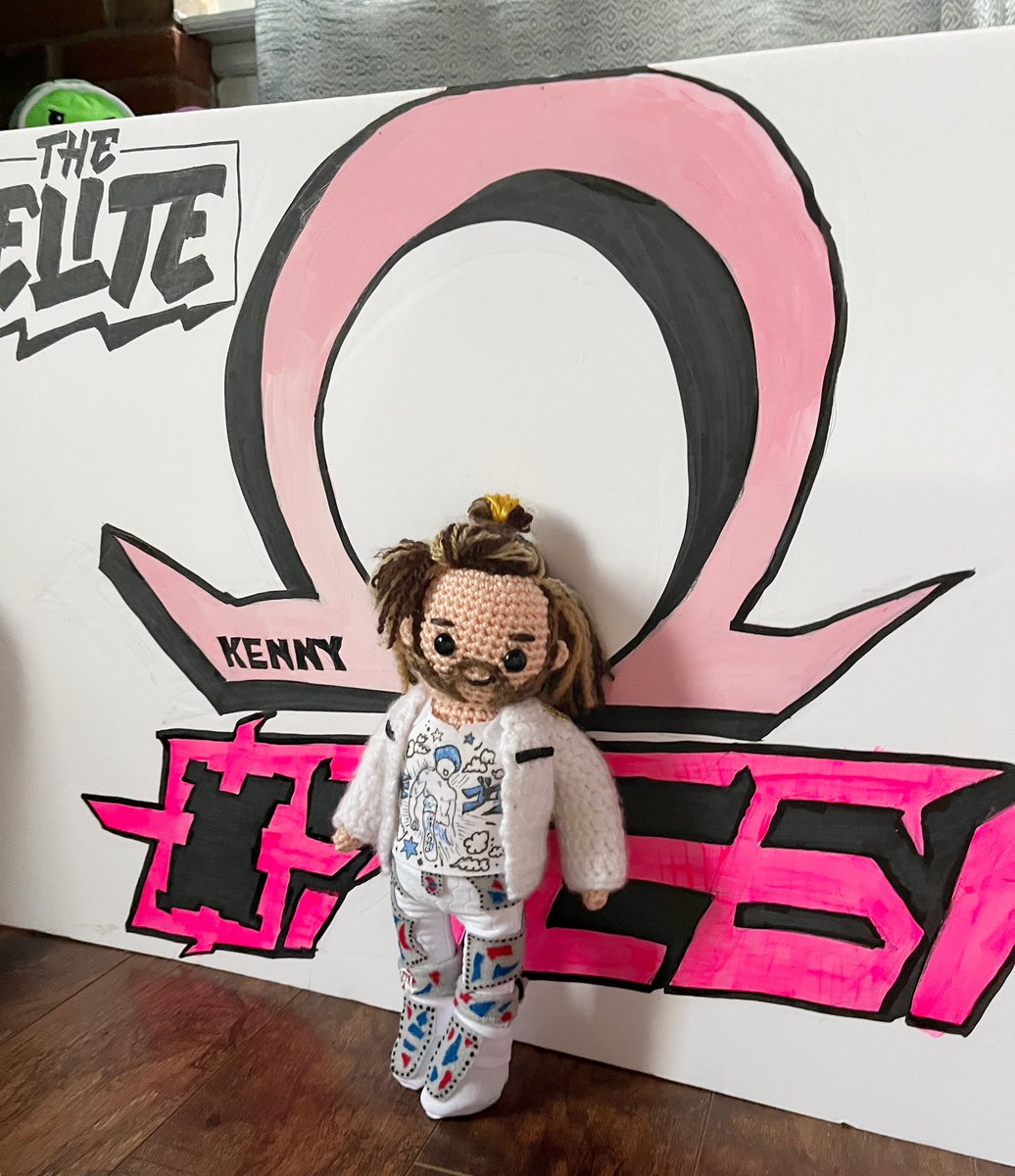 YoungBucks_AEW's tweet photo. Happy #Sunday π₯°
Kenny CrOmega has his favorite T Shirt on and standing in front of a sign! Both will be headed to #AEWDynamite in Detroit! π
#AEW #KennyOmega https://t.co/d0CNrgWXbD