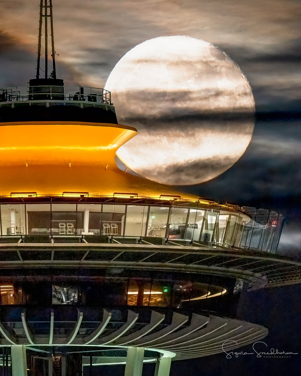 Chasing the #FlowerMoon... Finally we got a break in the clouds last night in #Seattle. Waning 97.3% moon rising behind an empty #SpaceNeedle.