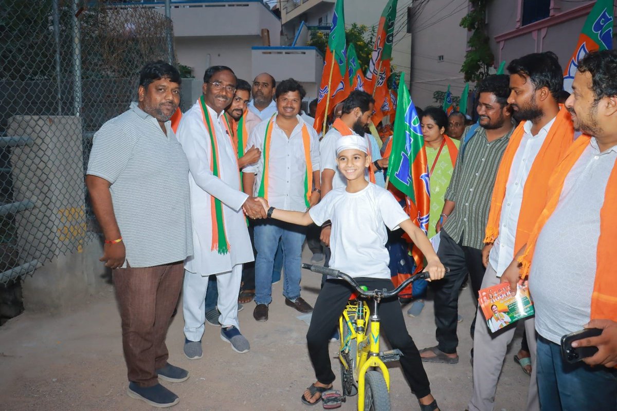 Shaking hands with a happy, energetic kid on his bike was a reminder of the pure joy that comes from human connection. Let's cherish these small moments and pedal towards a brighter future for #Serilingampally together! #CommunityDevelopment #HumanConnections  #NEET #GTvsLSG