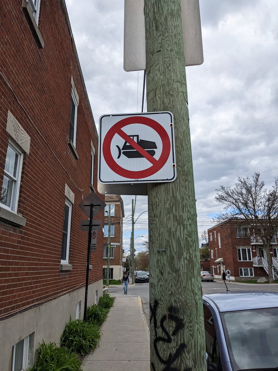 No snowplowing on sidewalks. Only in Montreal!