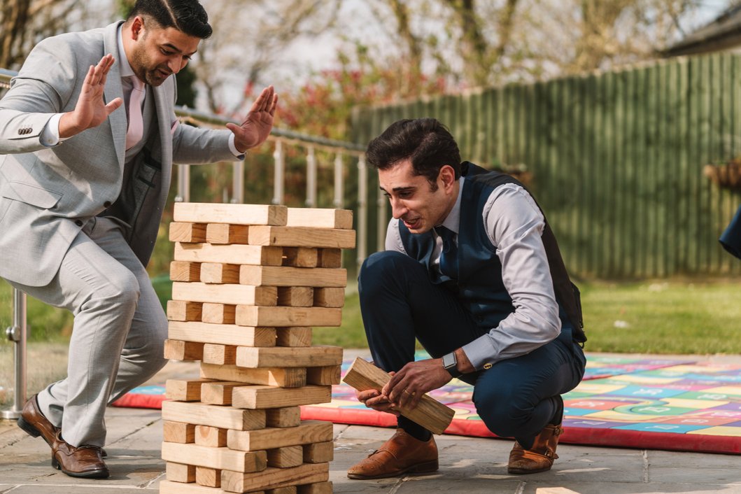 FlashbulbWales's tweet photo. Looking to add a good amount of tension to a wedding? Play Jenga. Also makes for good video &amp; photo moments. Just don't cry when you lose or your drink gets spilt in the action! 
.
.
.
.
@oldwallsgower #oldwallsgower #oldwalls #oldwallswedding #jengatime #bringthetension #wedding https://t.co/S1DOMEdjix
