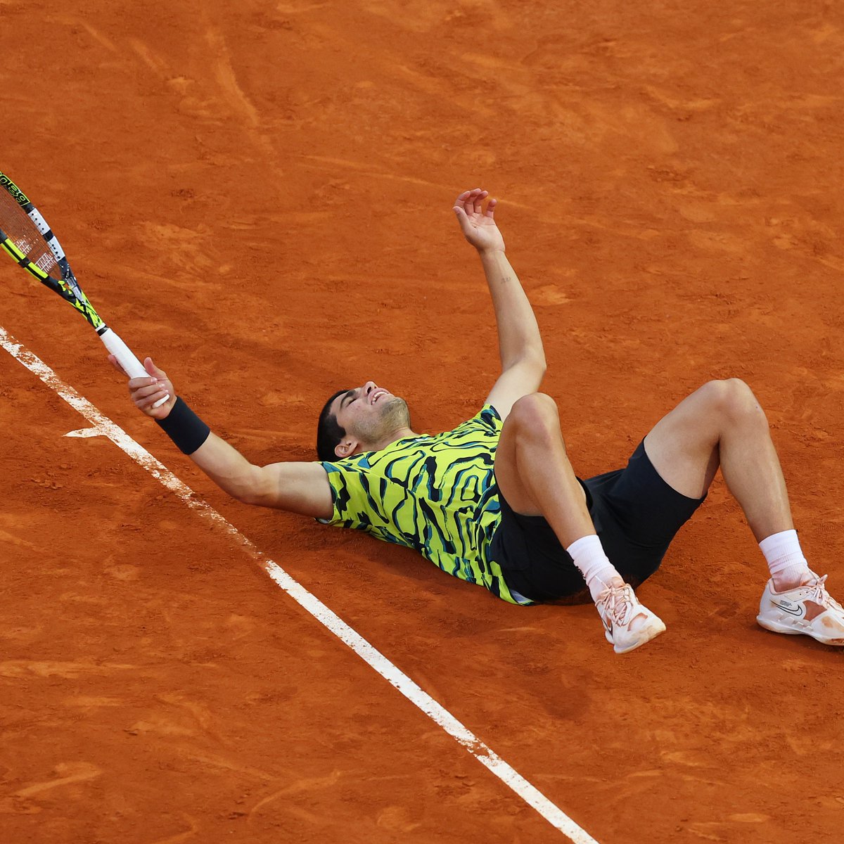 atptour's tweet photo. CARLOS DOES IT AGAIN! 🏆 🔥 

@carlosalcaraz wins his 10th title taking out Struff 6-4 3-6 6-3! 

@MutuaMadridOpen | #MMOPEN https://t.co/o9Kg6OOmYk