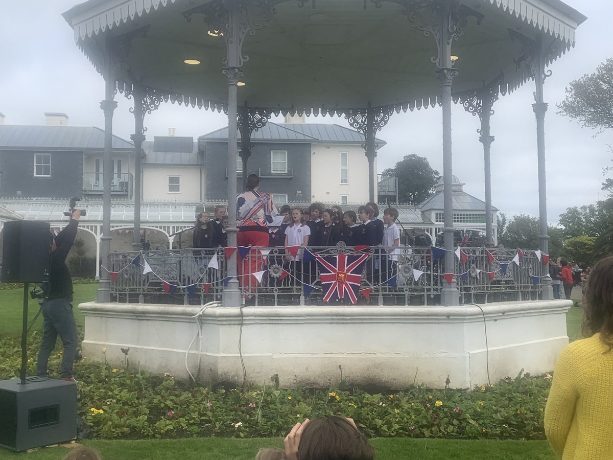ConstantineSch2's tweet photo. Our school choir were invited to sing on the bandstand at The Princess Pavilions on Coronation Saturday. They did the most fantastic job of entertaining the crowds and made us so proud @Kernow_Learning https://t.co/a2Aq7qRTA5