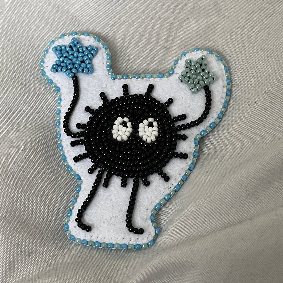 hello! i'm an Inuk beader based in ontario, canada. i love making beadwork with bright colours, i also make a lot of fandom related pieces. i occasionally take commissions, but usually i just post what i have for sale. below is some examples of past work i'm proud of: