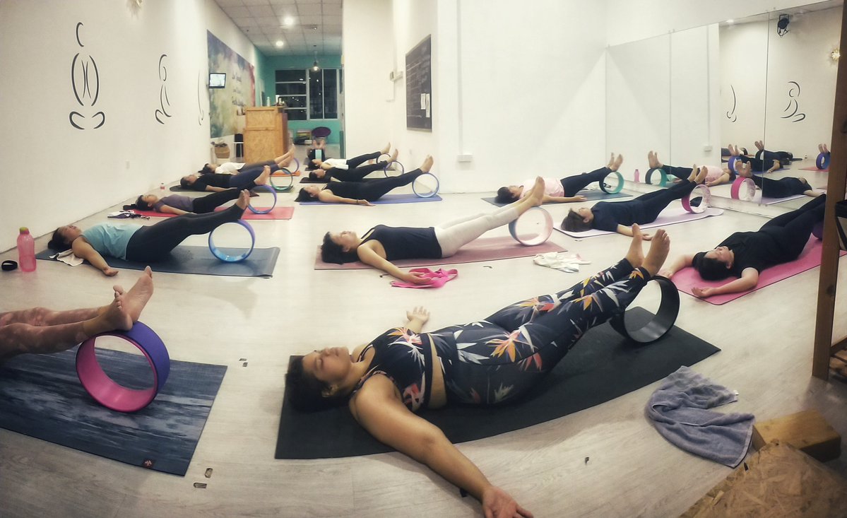 Corpse Pose legs raised on wheel (Shavasana)
This is an asana in hatha yoga & modern yoga as exercise, usually used for relaxation at the end of a session.

We used the wheel to 'rest' (stretch) the legs. 

#YogaMe
#CorpsePose