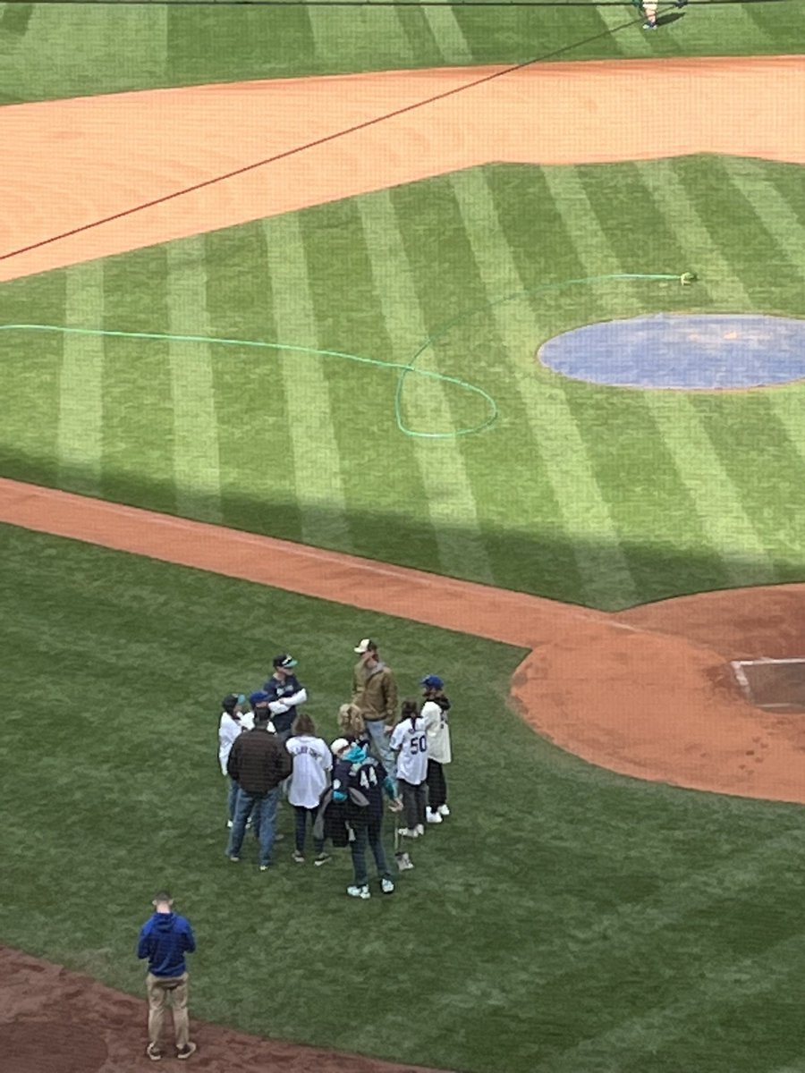 Bryce Miller and his family/friends still out on the field, soaking it all in. #Mariners