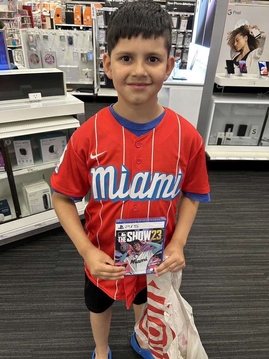 dennym1985's tweet photo. My guy excited to spend his bday cash. Got the jersey and the game. Happy 9th birthday bud @j_chisholm3 @MLB https://t.co/LF3bqOemOM