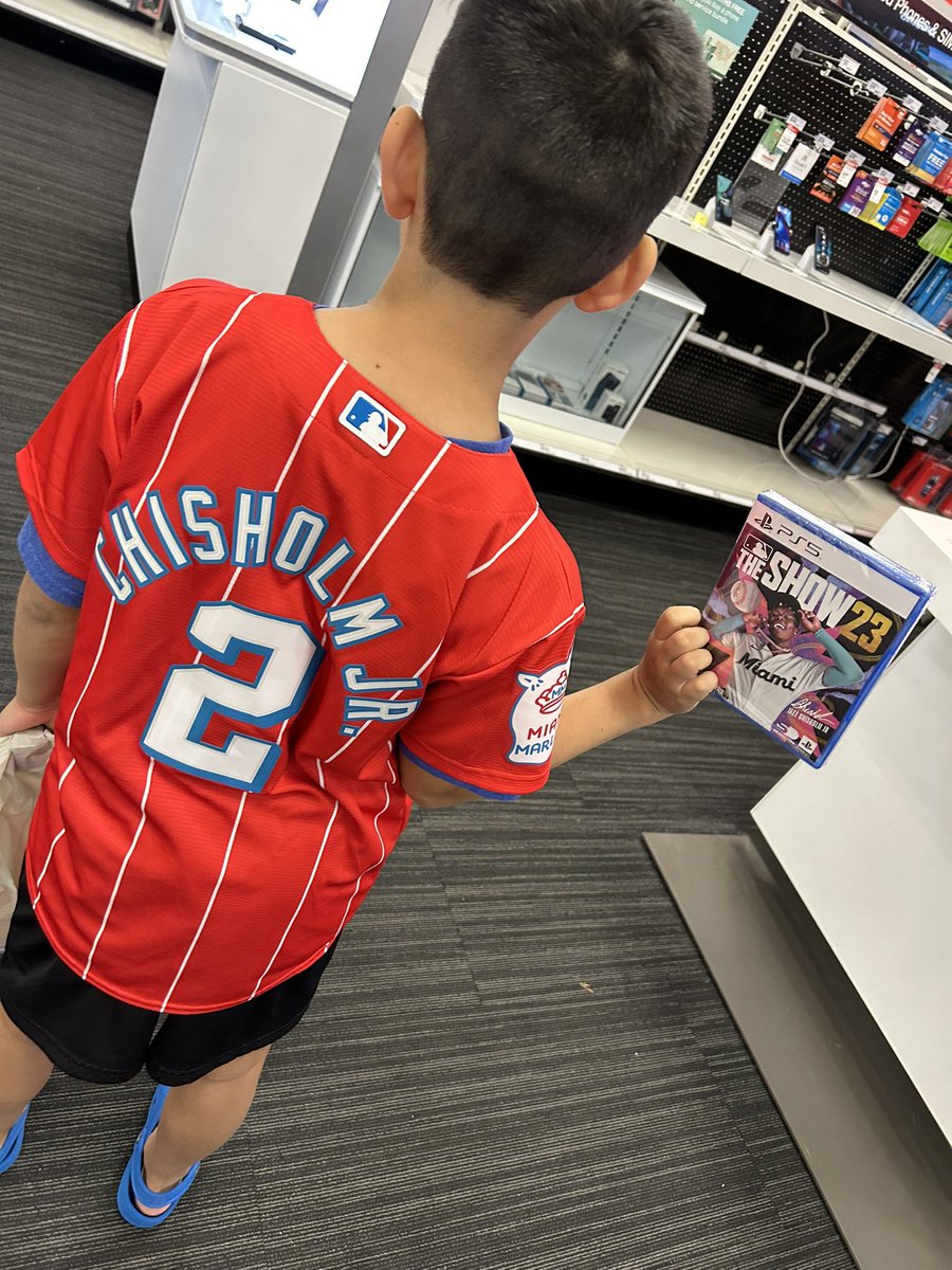 dennym1985's tweet photo. My guy excited to spend his bday cash. Got the jersey and the game. Happy 9th birthday bud @j_chisholm3 @MLB https://t.co/LF3bqOemOM