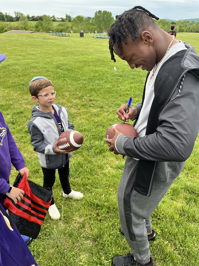 Eric_Dounn's tweet photo. Just finished up with rookie mini camp and wasted no time getting to know the community, Zay Flowers drove to Adamstown to Camp Shoresh to play some football with the kids! #LAA #ZayFlowers https://t.co/kBVCyqwYFs