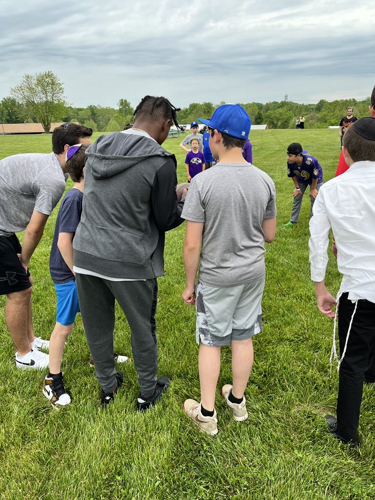 Eric_Dounn's tweet photo. Just finished up with rookie mini camp and wasted no time getting to know the community, Zay Flowers drove to Adamstown to Camp Shoresh to play some football with the kids! #LAA #ZayFlowers https://t.co/kBVCyqwYFs