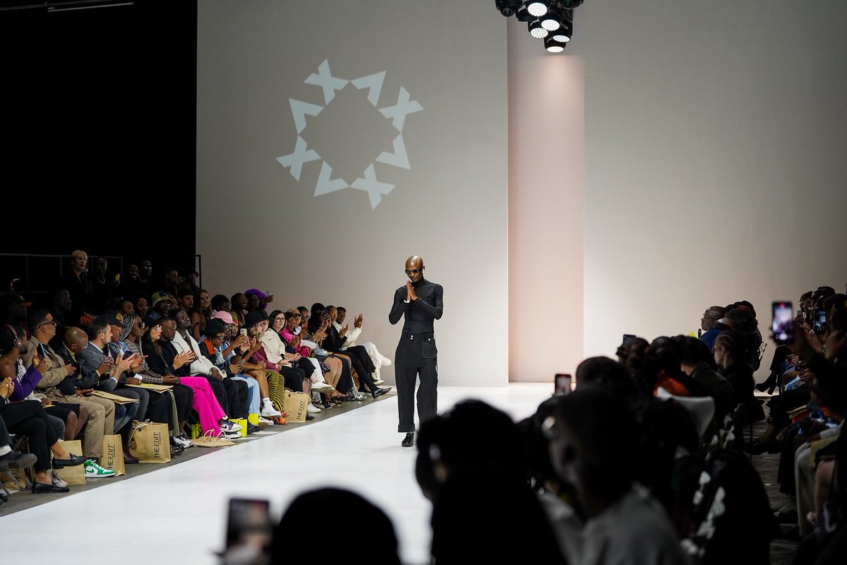 safashionweek's tweet photo. Here’s a quick recap of @Ntando_XV closing the runway for the 1st show on day 3 of South African Fashion Week! 

#SAFW #SAFashionWeek #SS23 #MallOfAfrica #CarltonHairSA 
#CRUZSAFW #OPPOxSAFW https://t.co/UUVDOBBWzm