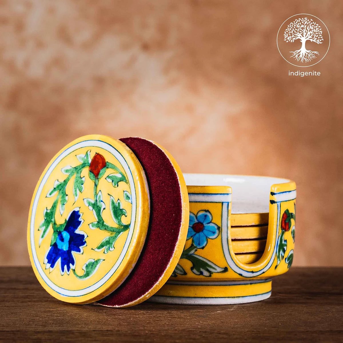 indigenite's tweet photo. Looking for a pop of colour in you space? Our Yellow and Multicolor Floral Coaster Set of 6 - Jaipur Blue Pottery is just what you need. Our Jaipur Blue Pottery is not only beautiful, but also functional. #handpainted #jaipurbluepottery #indiancrafts #handmadepottery #homedecor https://t.co/ZYYdJdgLAa