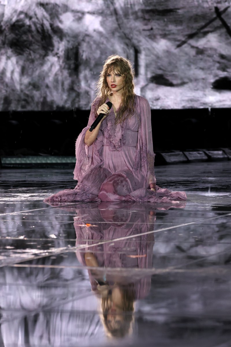 consequence's tweet photo. Taylor Swift played a rain-soaked show in Nashville on Sunday night. After a four-hour delay, Swift delivered a 45-song performance that ran until 1:30 AM: https://t.co/MfUSvGC3pU https://t.co/aSCI6v9Oza