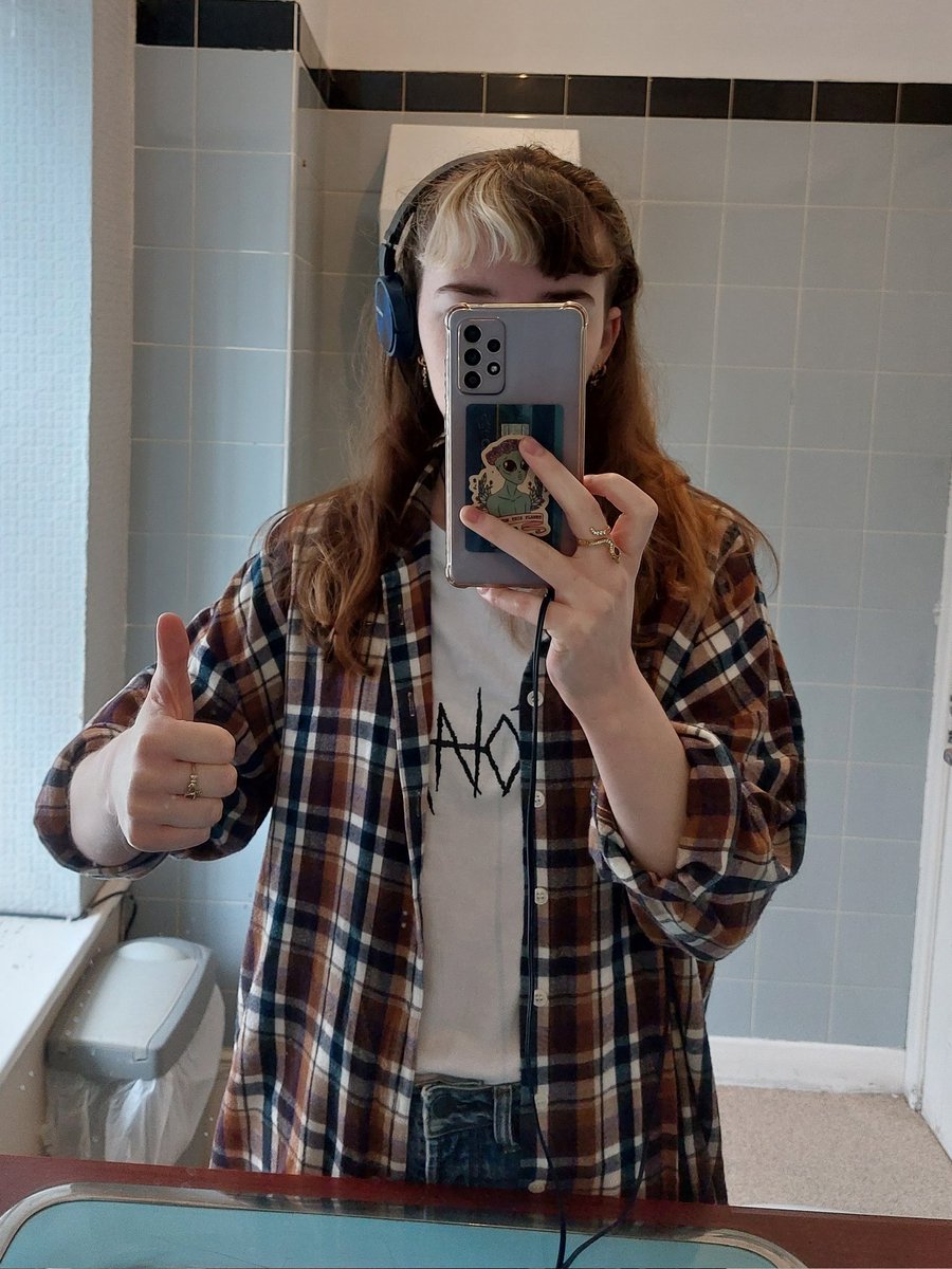 RaesideRose's tweet photo. I mostly bought this band t shirt because some guy spilled a lot of beer on me but now I'm glad I did because most of the time the only part of the name you can see is NO https://t.co/5Mur5KKAjR