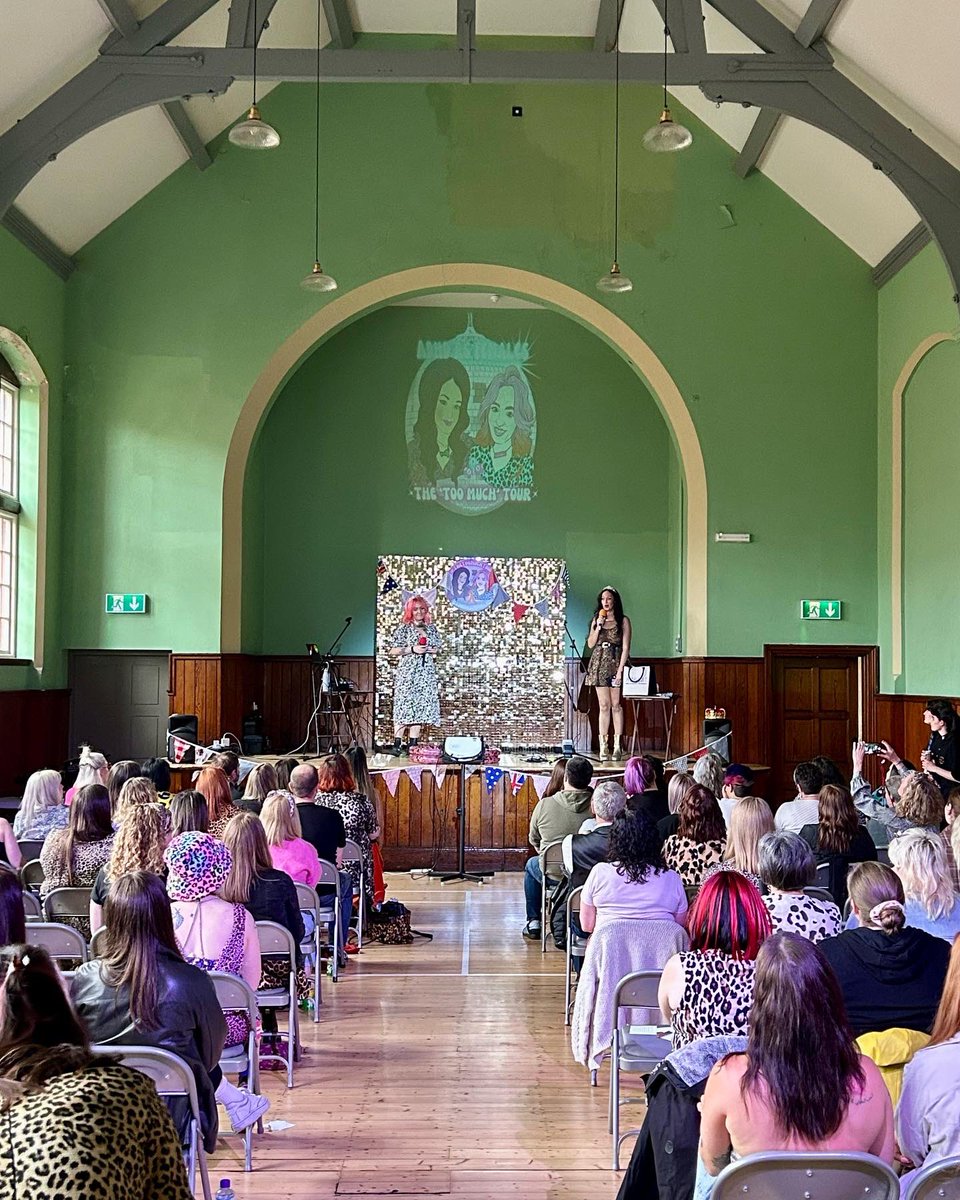 salfordladsclub's tweet photo. A busy bank holiday weekend at the club 💚 on Saturday we welcomed @ADHDAsFemales to our Concert Hall for their “Too Much” tour 🎙️ Dawn &amp; Laura also sported our orange Salford Lads Club sign shirt! We loved welcoming them &amp; the community they’ve brought together! 🐆✨🩷 https://t.co/h4evoYFzkn