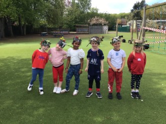 AcademyRaleigh's tweet photo. #CoronationDay celebrations! Wild crowns and wearing red, white and blue. #Coronation https://t.co/L6s6c6Rqyc
