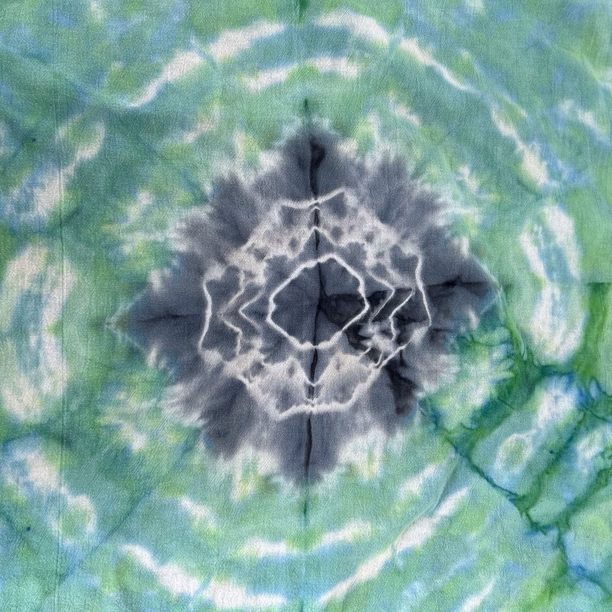 practicalandp's tweet photo. First 3 tries at mandala tie dye. Not the prettiest thing on the internet but I'm excited to keep trying  https://t.co/FZYCsQ6WYD #tiedye #tiedyemandala https://t.co/kPFOdJU7TW