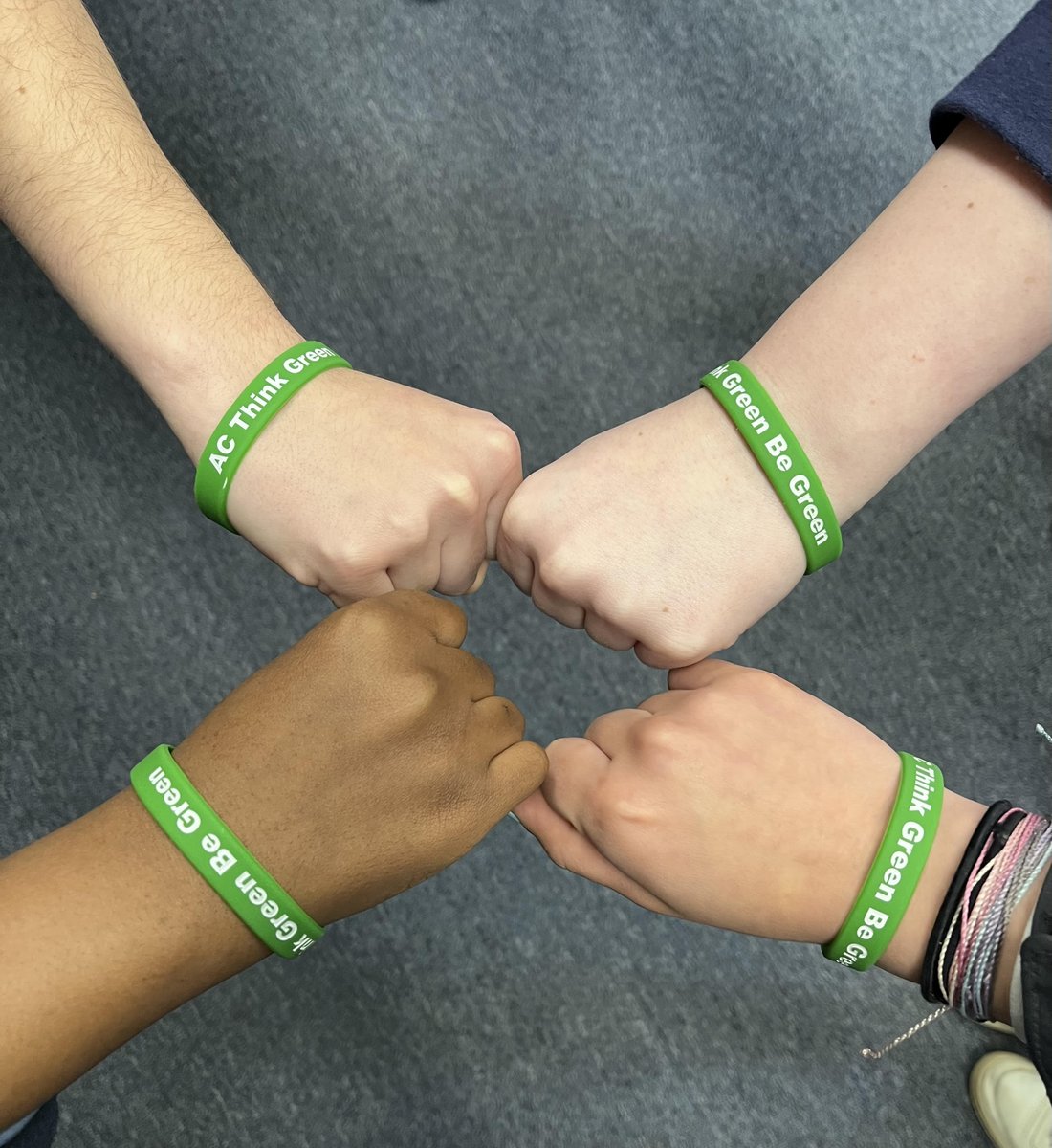 The Climate Club presented a check and children's nature book to Fr. Marc for the elementary school at St. Theresa of Lisieux Parish, Lusaka, Zambia. The club is donating the check to the school's library for nature and science books.