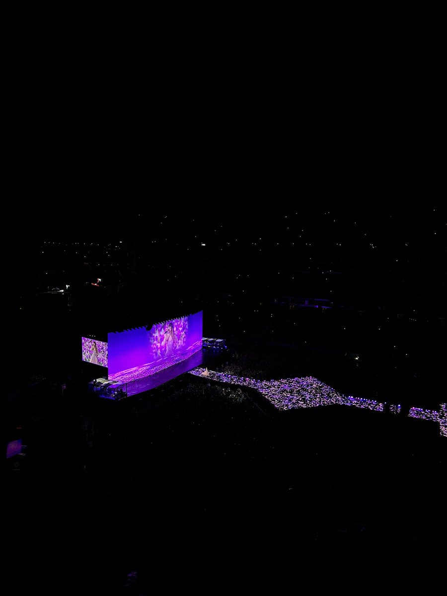 Kaylee_K13's tweet photo. we came in with the rain last night! 😉#TSErasTourNashville @taylornation13 Had to dig up the old pictures for the Taylor’s version announcement!💜✨ https://t.co/gqIXuSkbLy