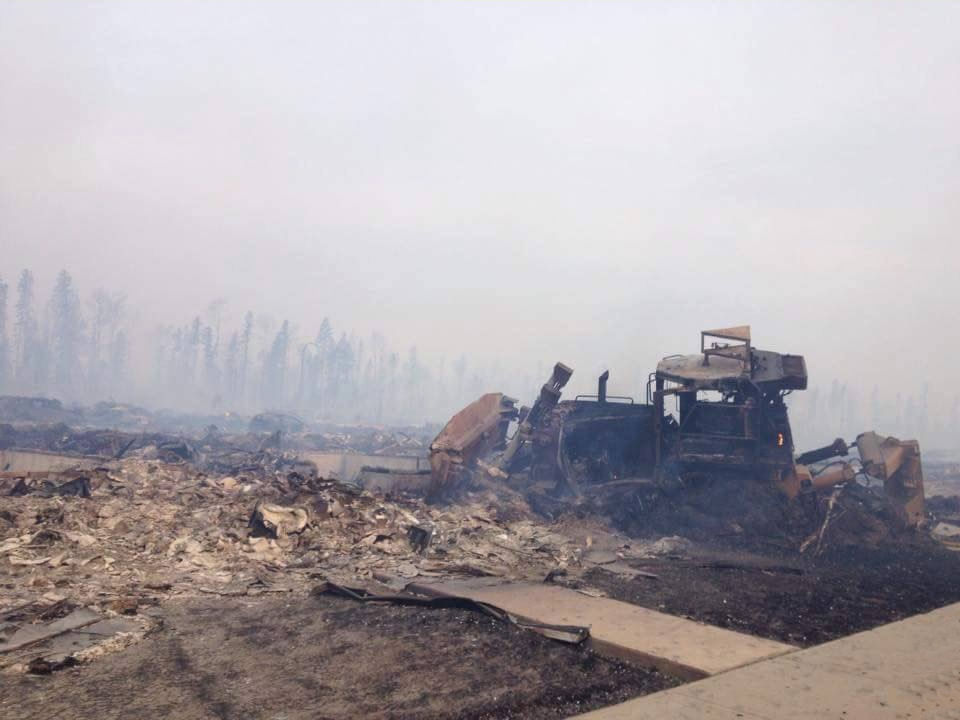 NACGConstructs's tweet photo. In 2016, NACG lost this D10 dozer while attempting to help fire crews contain the Fort McMurray wildfire. While our loss was minor, thousands lost their homes and businesses. 

With so many wildfires underway, we salute the firefighters and first responders who ensure our safety. https://t.co/xEHjjjwnLZ
