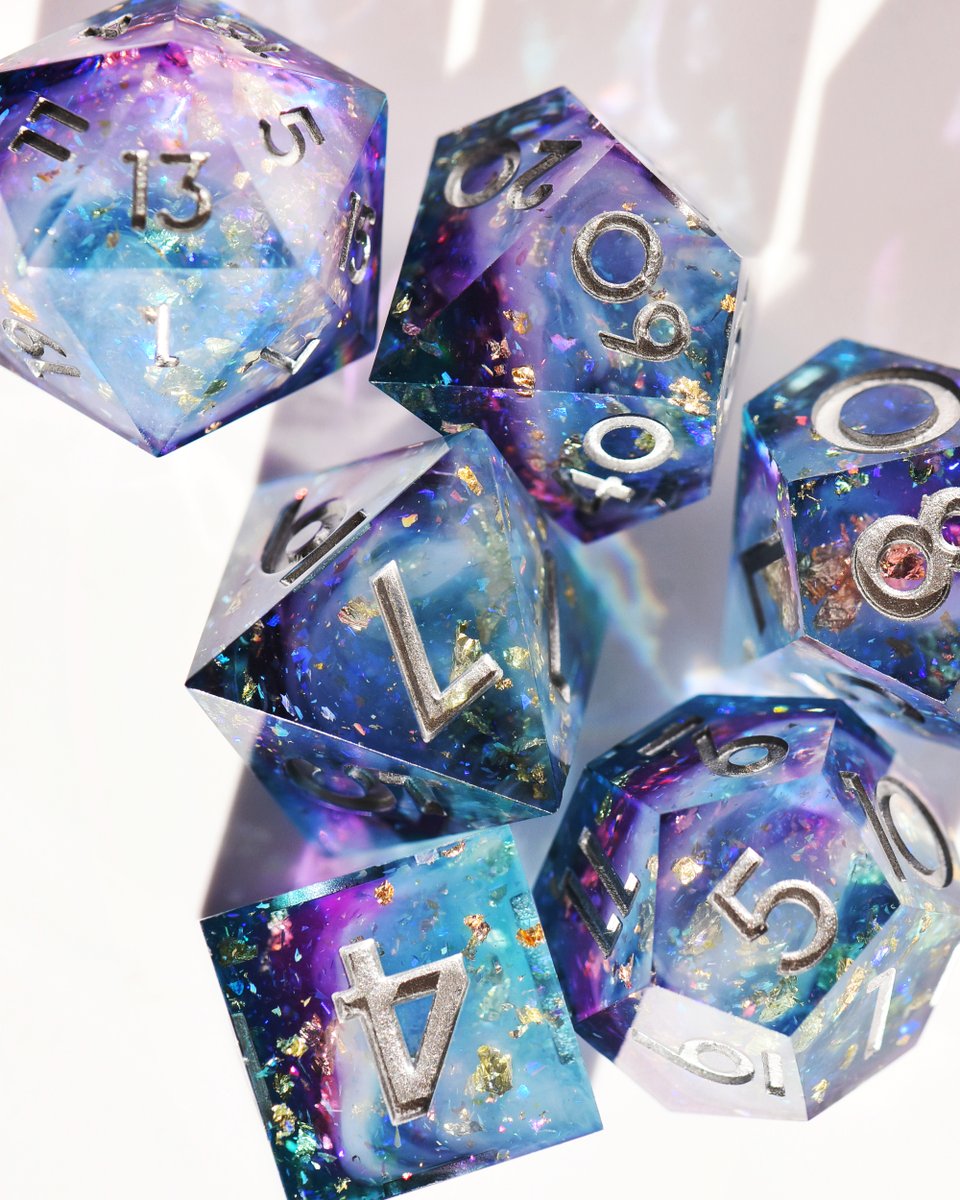 dispeldice's tweet photo. A cool-toned set with twilight tones of violet and cool blue.
Experimental dice, inked in softly tarnished silver. 

Sign up for more info on drops, giveaways and more: https://t.co/c0Z1SyxDMa https://t.co/fxpSLDYGGG