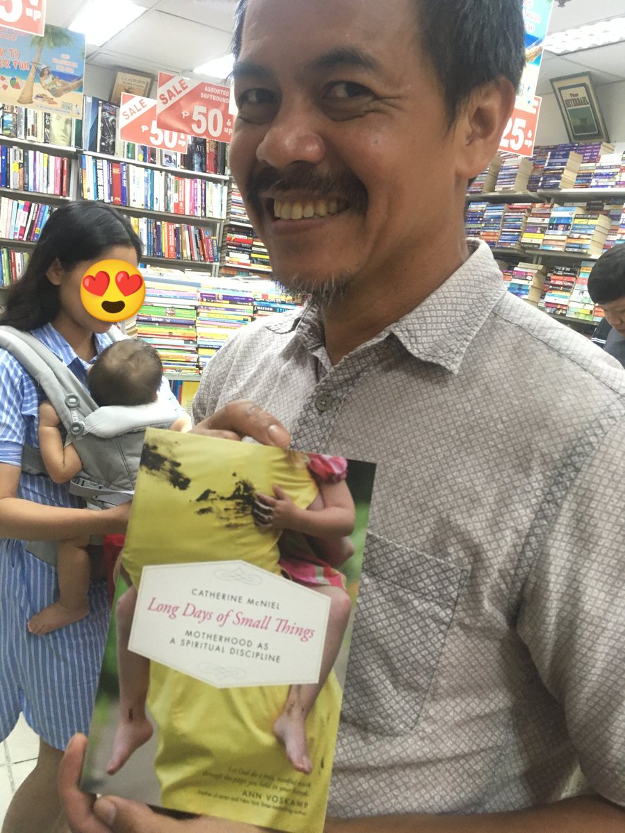CatherineMcNiel's tweet photo. My friend @kuribod found a copy of #longdaysofsmallthings in a bookstore IN THE PHILIPPINES. He's gonna try and sell it to that mom behind him. 😁🤞

Either way, this feels like a win. (Thanks, Sam!!)

(Reminder that I'm running a BOGO sale right now. Details below....) https://t.co/VyotfxBhEX