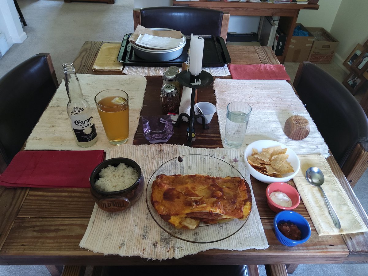 Cheese enchiladas with Mexican rice, tortilla chips, sour cream and salsa on the side for my personal Cinco de Mayo celebration. Anyone want some? 😋