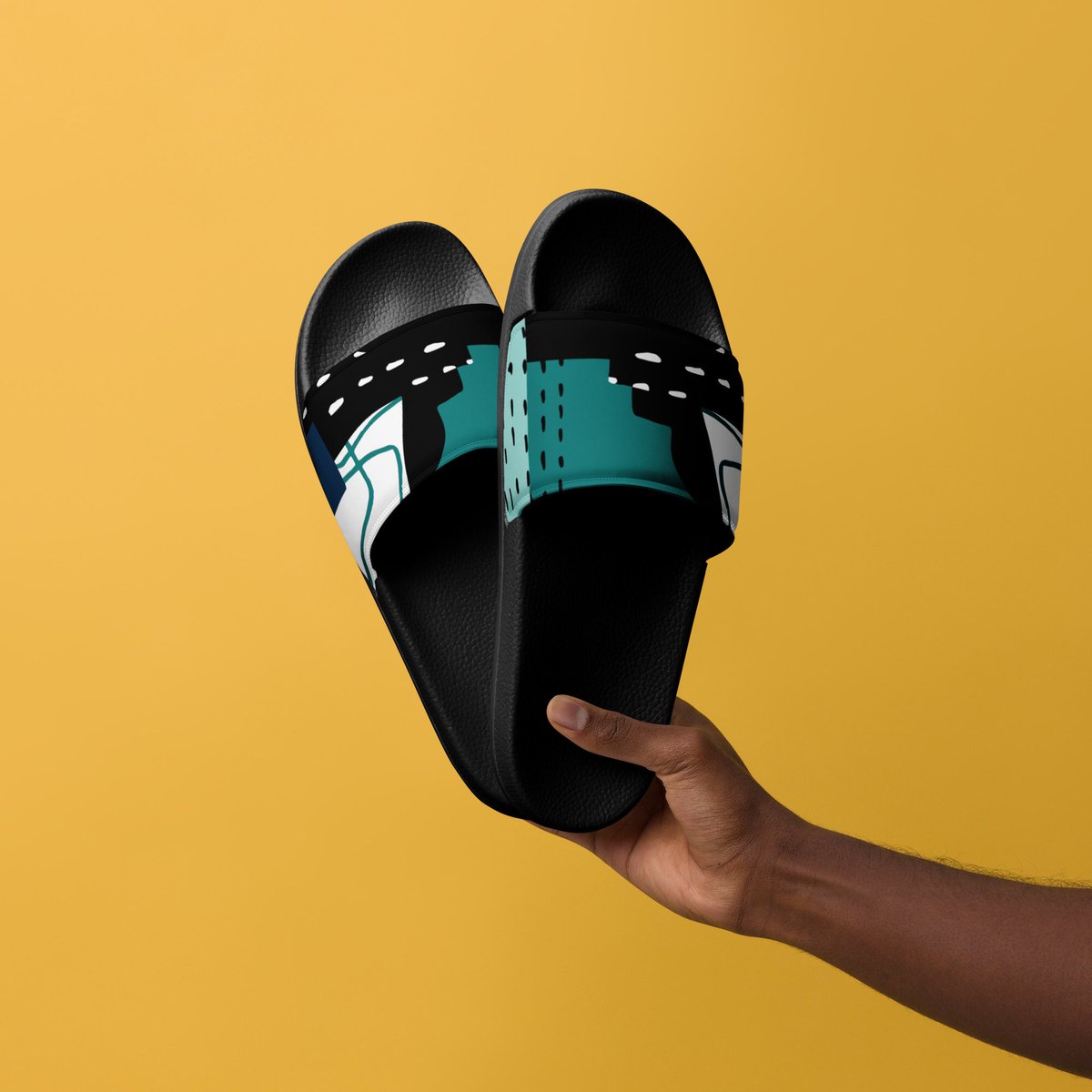 SNakhlar's tweet photo. Summer is right around the corner and it's time to upgrade your footwear game! Check out these stylish men's sandals with black soles and crisp white geometric patterns on the straps. https://t.co/x5MUBkdyx2
#menssandals #summerfootwear #fashionforward #geometricdesigns https://t.co/DmodfCxxD7
