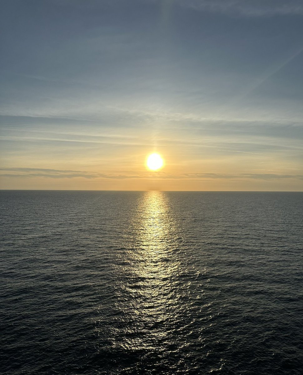 @admired_art eating dinner on a cruise and this is the view from the window! #royalcaribbean #symphonyoftheseas #sun #sunset