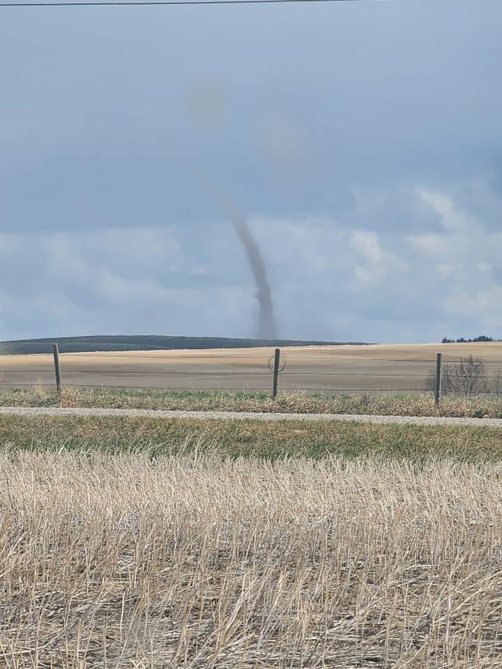 Landspout tornado near Huxley AB 20 minutes ago has since dissipated pic taken by Jeff Reader #abstorm