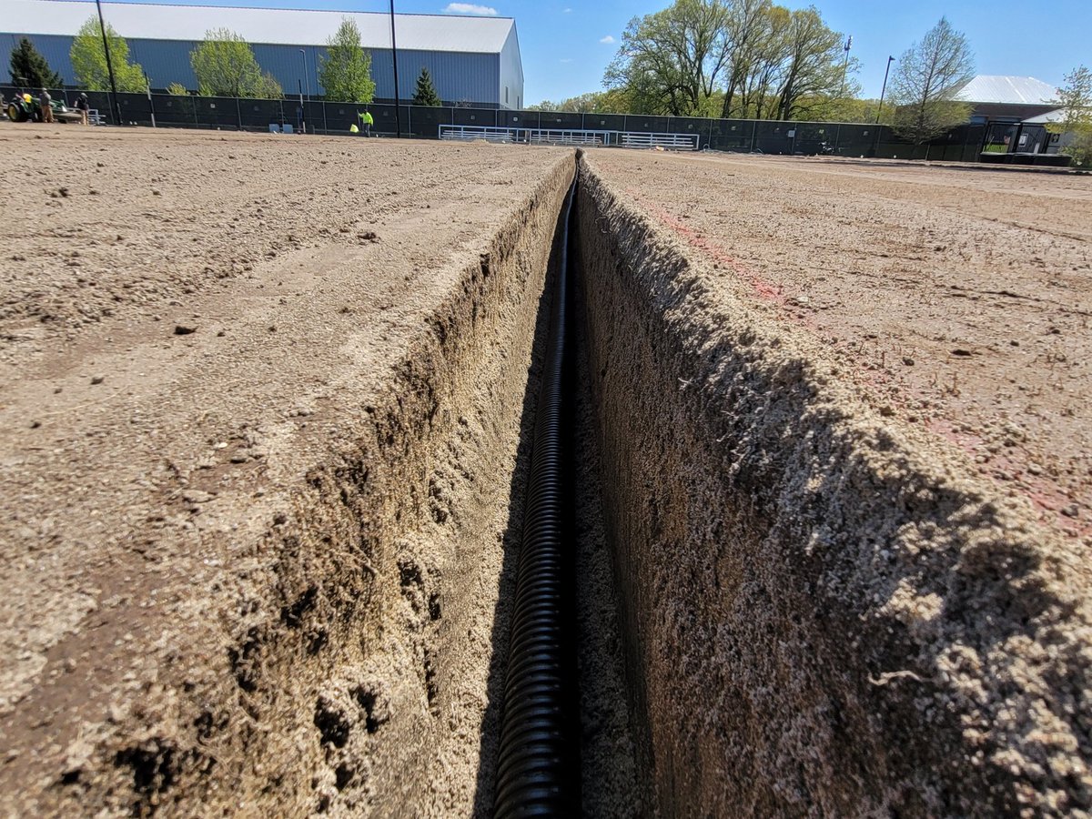 PUSportsTurf's tweet photo. Got behind on updates, but here is the progress for #FolkField reno. Second pass of stripping completed, back filling of extra excavation around benches, supplemental drain lines cut, pipe installed, and backfilled. 1/ https://t.co/orrNmJdiVv