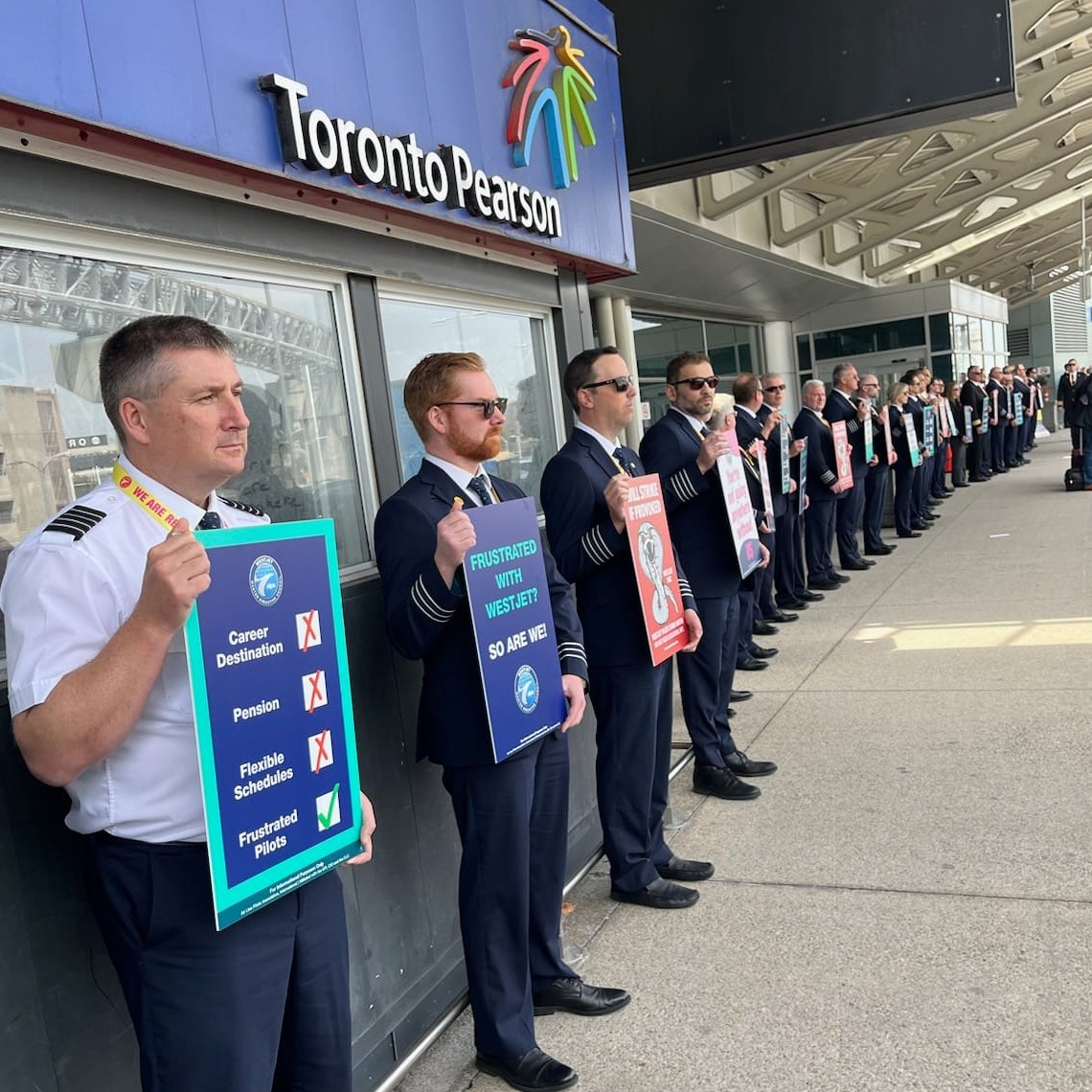 WestJetALPA's tweet photo. @WestJetALPA Pilots are standing in protest in @FlyYYC @yvrairport @TorontoPearson  to press the company to #showUsAfuture. Stop stalling on negotiating a market-based contract.
   
Visit https://t.co/qJIq8qBi18

#WeAreReady #contract2023 #WestJetPilots #ALPAPilots #YVR #YYC #YYZ https://t.co/7uZt3il2SE